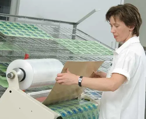 printed foils assembled with adhesive layers